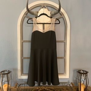 Black Dress with Sheer Design Accent